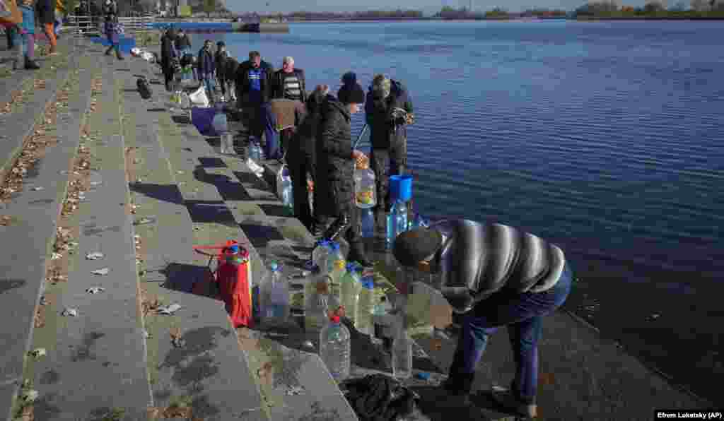 Yet as Kherson's residents collect water from the Dnieper River, the sounds of explosions serves as a constant reminder that the war is far from over.
