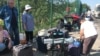 Scores of Ukrainians hoping to visit their homes in Russian-occupied areas are being stranded in no-man's-land as they await clearance to enter.