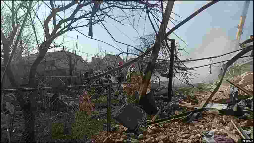 Emergency responders work at the scene of a Russian missile attack in Khmelnytskiy in western Ukraine on March 21. Local authorities reported that one person had been killed and several wounded.