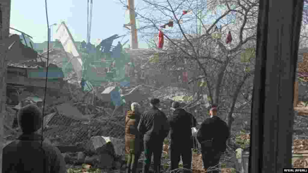 Emergency responders search for survivors. 