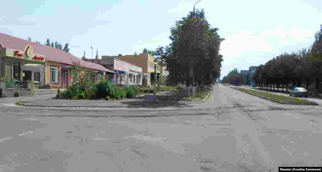 A row of shops that now no longer exist, in Maryinka in August 2014. "I could never have imagined that Maryinka would soon not have a single resident, not a single surviving house," Grom says. 