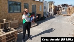 Doina Iliescu photographed outside her temporary accommodations in Crevedia. 