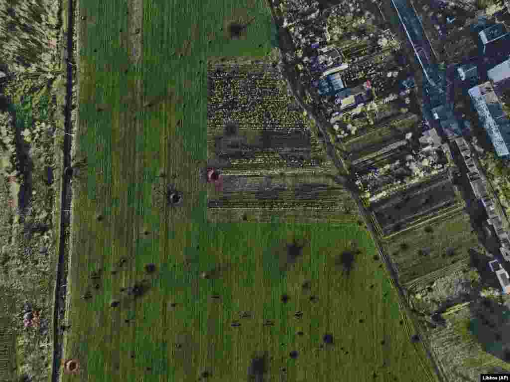The cratered landscape of a Bakhmut field. Serhiy Cherevatiy, spokesman for Ukraine&#39;s eastern forces, said on April 26 that Russian forces had attacked 324 times using artillery and multiple rocket launchers within the past 24 hours. &nbsp;