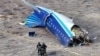 A drone view shows the crash site of a passenger plane near Aqtau, Kazakhstan, on December 25. 