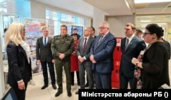 Mykalay Karpyankou (in military uniform) and Ihar Karpenka (third from right) attend the presentation of the military-patriotic club in Minsk in 2021.