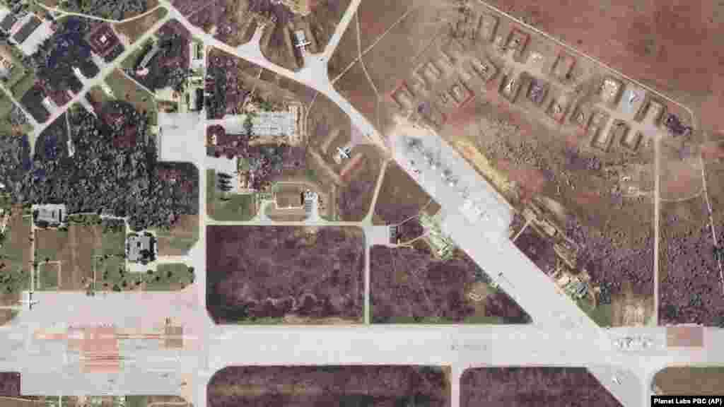 A photo of the air base by Planet Labs after the explosions, showing the charred wreckage on August 10. The Russian Navy lost at least nine military aircraft, including Su-30SM fighters and Su-24M bombers, an analysis of before-and-after images by Schemes, an investigative unit of RFE/RL's Ukrainian Service, indicates.