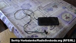 Inga switched her mobile phone to airplane mode in case Russian troops came in for an inspection.