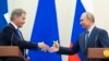 Russian President Vladimir Putin (right) shakes hands with his Finnish counterpart, Sauli Niinisto, following a meeting in the Black Sea resort of Sochi in August 2018.