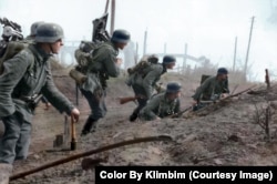 Nazi troops of the doomed 6th Army advance on Stalingrad in 1942.