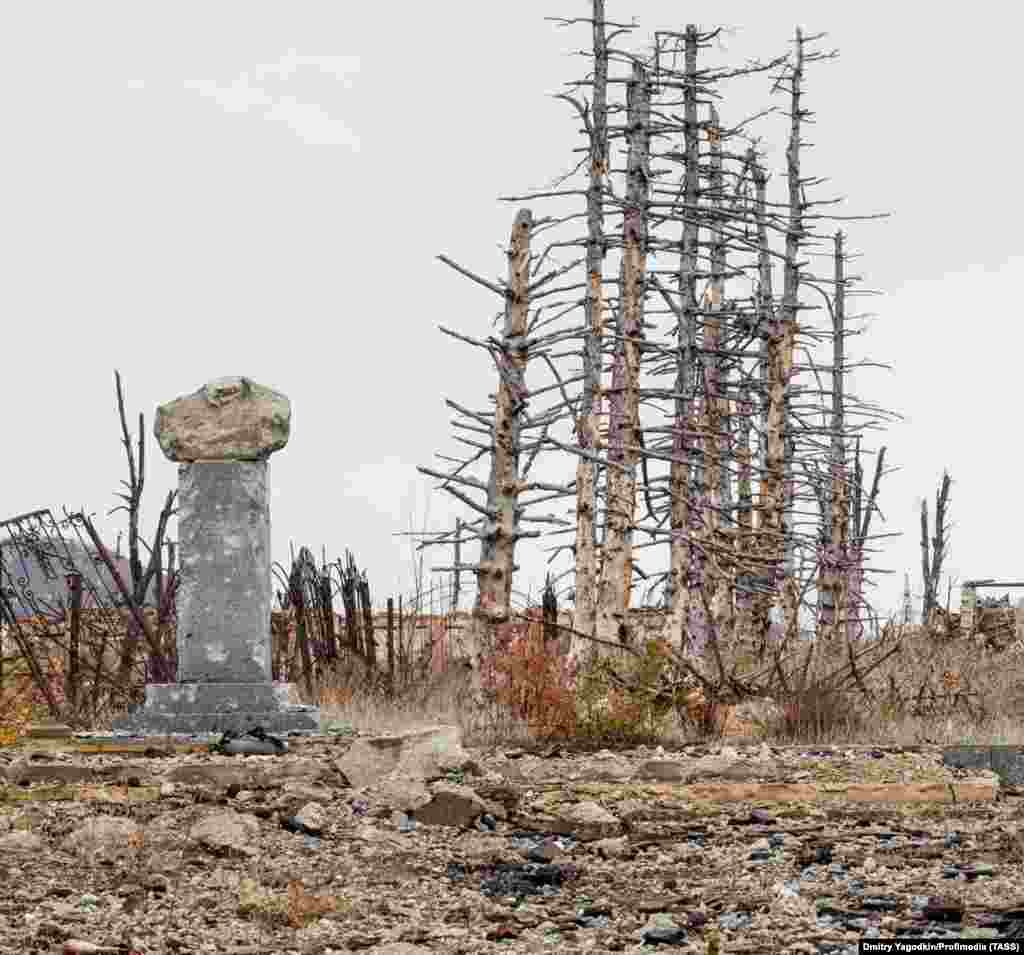 This bullet-chipped stump is what remains of a monument to Ukrainian poet Taras Shevchenko in the center of Maryinka. The ruins of the eastern city were captured by Russian forces in December 2023. 