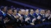 В центре - президент РФ Владимир Путин, слева от него - директор ФСБ Александр Бортников, а справа - директор Службы внешней разведки Сергей Нарышкин