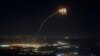 Rockets fired from southern Lebanon are intercepted by Israel's Iron Dome air-defense system over the Upper Galilee region in northern Israel on August 4.