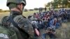 A group of migrants detained in Subotica, northern Serbia, on July 13, 2022