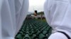 Coffins containing remains of victims of the Srebrenica massacre