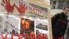 A poster in Belgrade marks the 10th anniversary of the NATO bombing campaign against Serbia.