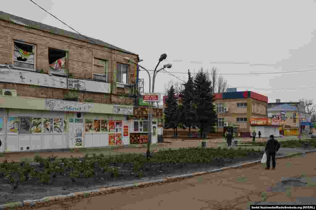 The city slowly comes to life as we continue walking, people are appearing, carrying water and food. A makeshift market is operating nearby. It feels almost like any normal winter morning in a provincial eastern town, only the booming of nearby explosions offers a constant reminder of the situation in Pokrovsk. 
