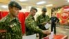Belarus -- Special anti-terrorist troops commandos leave a polling booth during pre-term election in the army in Minsk, 23Sep2008