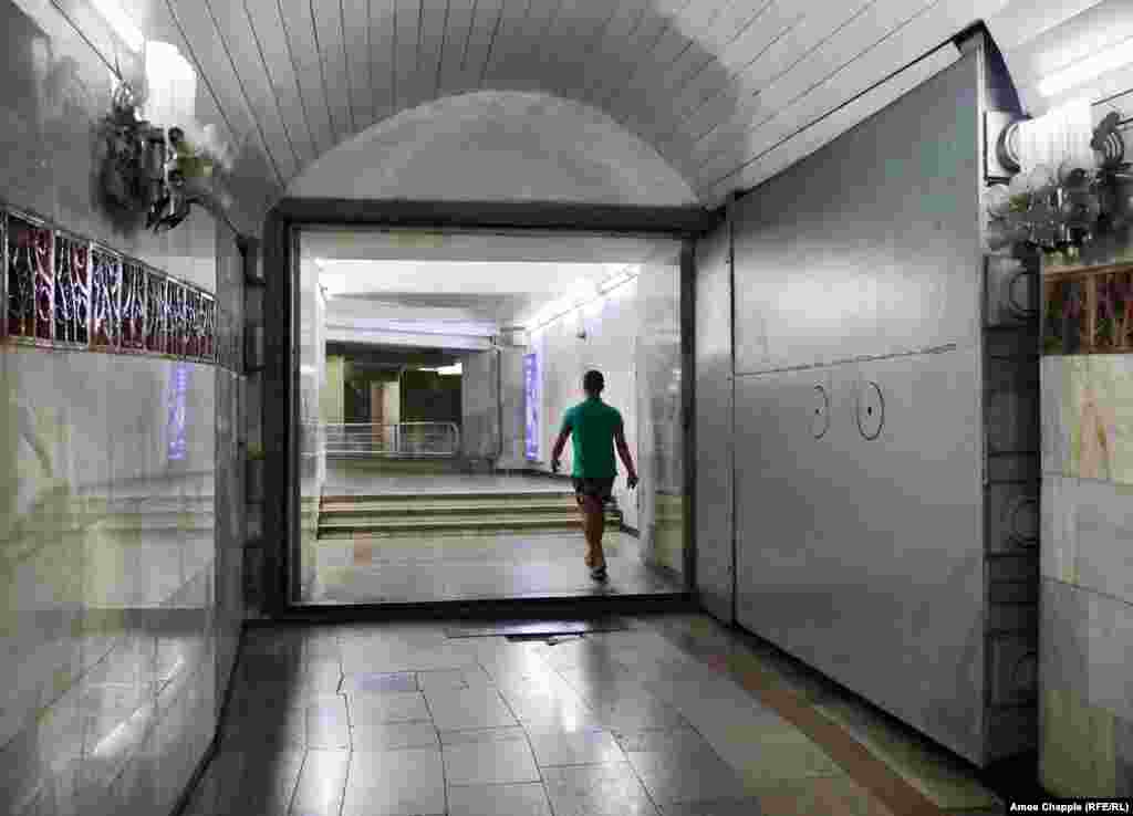 A 2018 file photo shows a blast door inside the Soviet-era metro in Tashkent, Uzbekistan. Prague's nuclear shelter network inside its subway is one of a handful of its kind in the world. Some sections of the subways in Moscow, Kyiv, and Tashkent (pictured) are also equipped to protect people from weapons of mass destruction. 