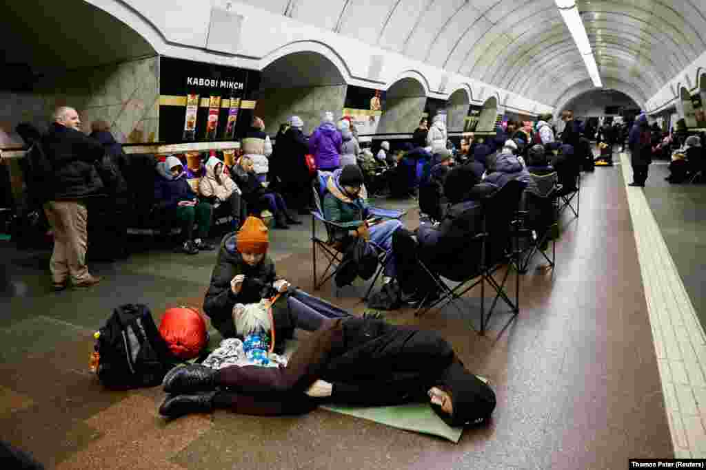 People sheltering from strikes inside the Lukyanivska station in December 2024.The subway station is one of many in Kyiv that is frequently filled with residents from nearby buildings who shelter here during air alerts.