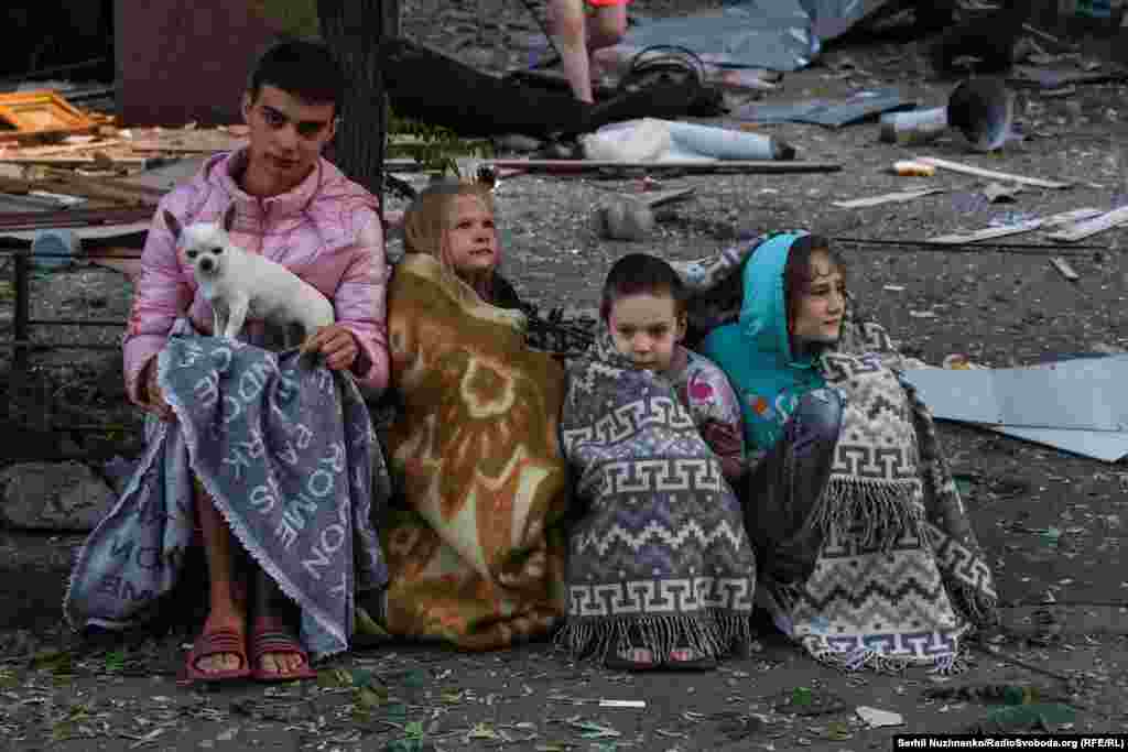 Scores of people were evacuated from damaged and destroyed buildings in Kyiv. At least 23 people were confirmed killed, including four children.