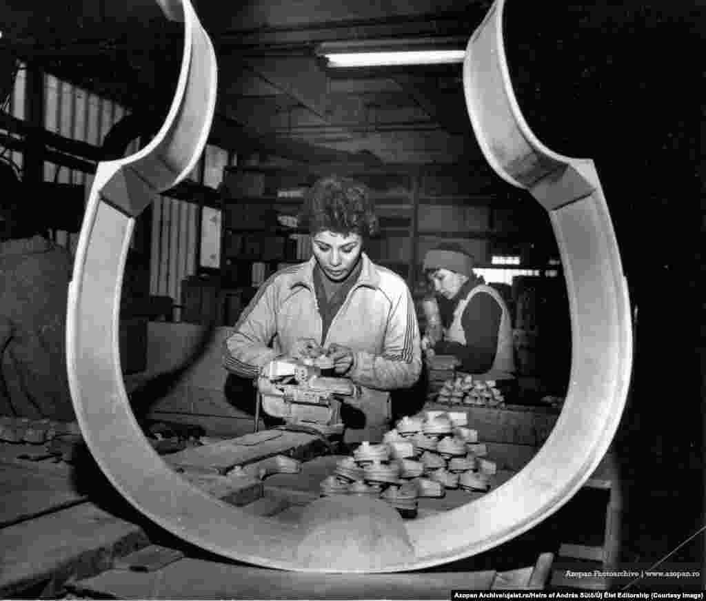Workers inside a musical instrument factory in Reghin, Transylvania, in 1980 “I contacted them and they were glad,” Szocs recalled of the thousands of images he discovered in the rural library. “They said, ‘Oh, wow, you’re interested in those?' Because they’d just been sitting there for years.” 