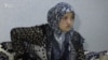 Nilufar Radžabova kaže da joj je jedan od policajaca prijetio da će je silovati.
