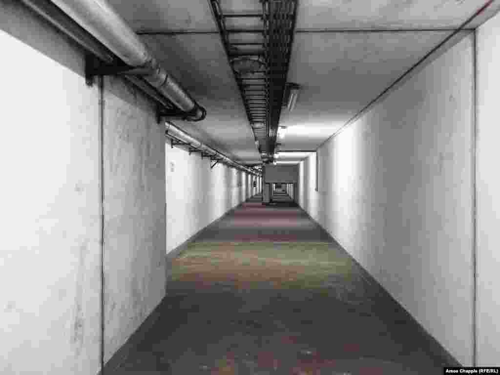 A corridor beneath Prague alongside a public subway station. Before the full-scale Russian invasion of Ukraine, several senior members of the city council were pushing to have Prague’s nuclear shelters decommissioned. 