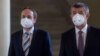The Czech Republic's newly appointed Foreign Minister Jakub Kulhanek (left) and Czech Prime Minister Andrej Babis speak to journalists in Prague on April 21. 