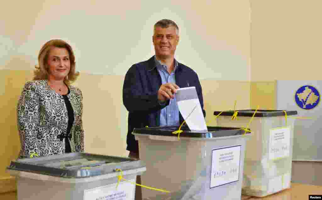 Kosovo's prime minister, Hashim Thaci, and his wife vote in the capital, Pristina.