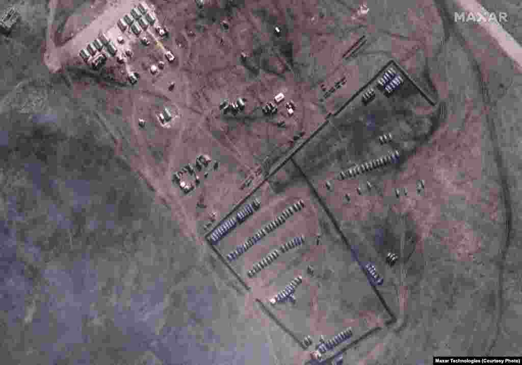 Armored vehicles of a new deployment are visible in Slavne on Crimea's northwest coast on February 9.