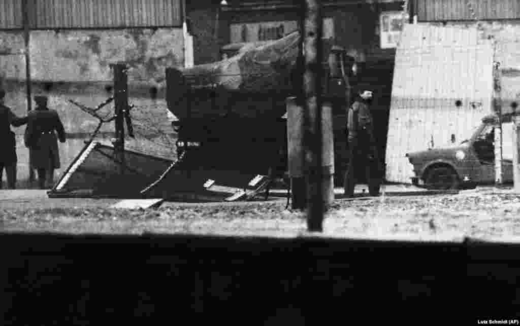 Efforts to stop people fleeing from "actually existing socialism," was a constant battle for the East German authorities as their citizens devised new ways to flee to freedom. This truck was rammed through a section of the Berlin Wall in February 1989. Three East Germans inside leapt out, wearing wetsuits, and jumped into the Spree River. Two successfully swam to West Berlin while the third was caught by an East German patrol boat and imprisoned. 