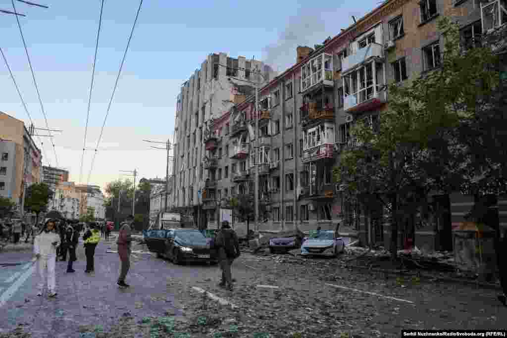 Municipal employees worked to clean up debris and damage that littered Kyiv's streets.