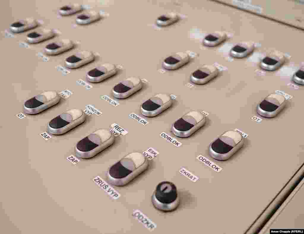 Buttons on a desk in a control room of an OSM shelter. With the recent escalations seen between Russia and the West, one persistent criticism of the shelter system -- its cost -- has faded away.